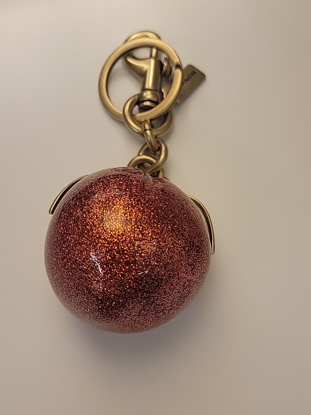 Coach Glitter Peach Pom Keychain - Picture 4 of 7